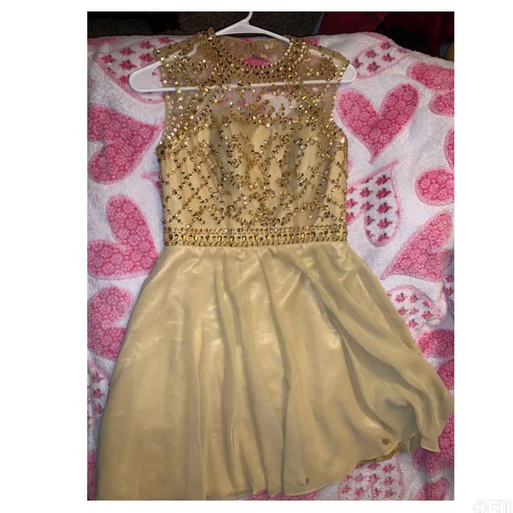 Yellow / gold dress